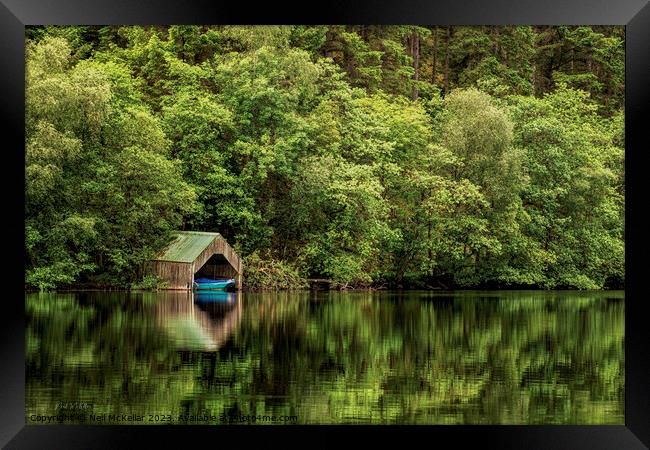 Mirrored Boat in the Boathouse Framed Print by Neil McKellar