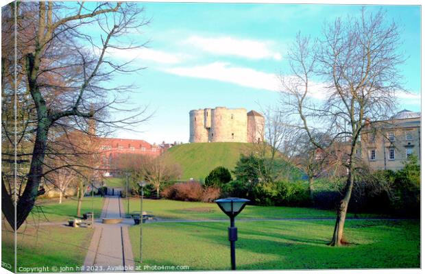 Clifford's tower at York castle. Canvas Print by john hill