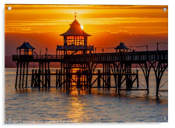 Clevedon at sunset with a streak of sunlight going through the pier head Acrylic by Rory Hailes