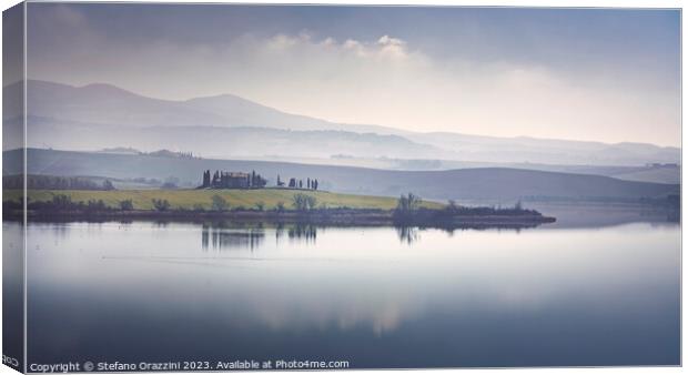 Lake Santa Luce view in a misty morning. Tuscany, Italy Canvas Print by Stefano Orazzini