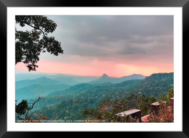 a view of forest in and orange sunset , a view from munnar kerla india Framed Mounted Print by Anish Punchayil Sukumaran