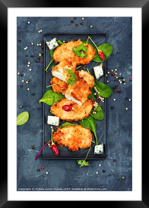 Breaded spicy chicken breast. Framed Mounted Print by Mykola Lunov Mykola
