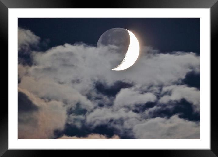 Cloudy Crescent Moon with Earthshine Framed Mounted Print by Susan Snow