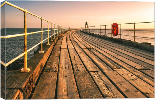 Golden Sunrise at Whitby Pier Canvas Print by Tim Hill