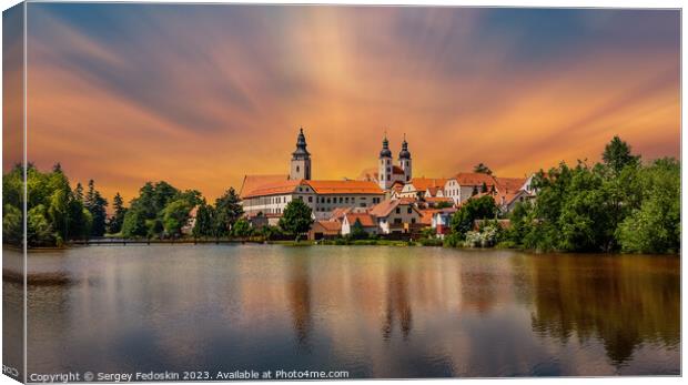 View of Telc across pond with reflections, South Moravia, Czech Republic. Canvas Print by Sergey Fedoskin