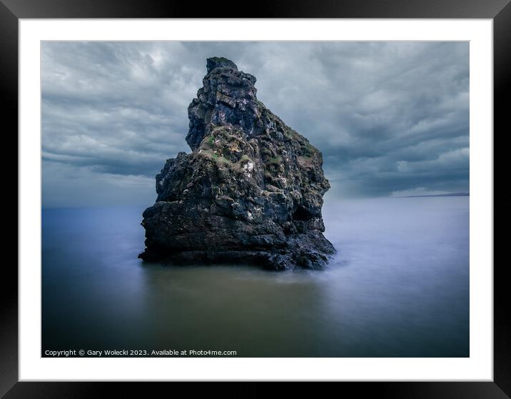 Storm rock feature  Framed Mounted Print by Gary Wolecki