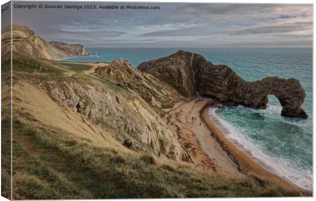 Durdle Door, Dorset with Man O'War beack in the background  Canvas Print by Duncan Savidge