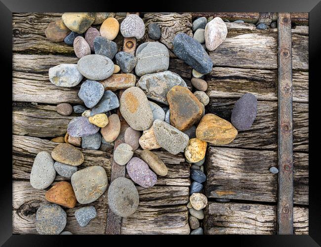 Newgale - Pebbles on the Boardwalk. Framed Print by Colin Allen
