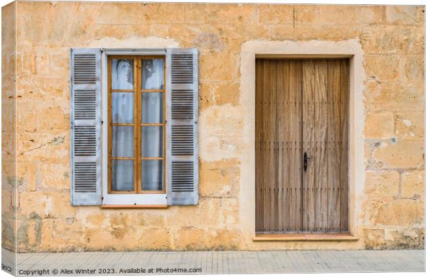 open window shutters of rustic house Canvas Print by Alex Winter