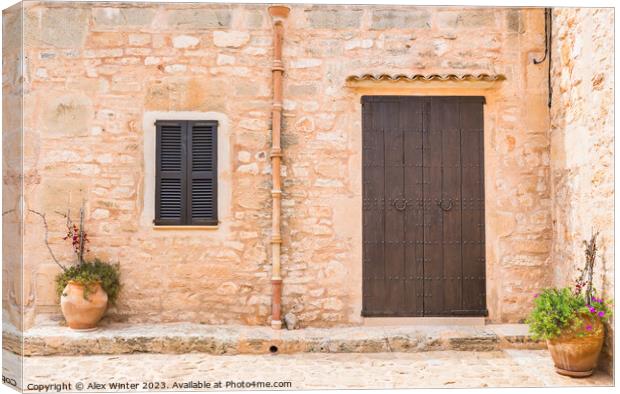 Front view of mediterranean stone house Canvas Print by Alex Winter
