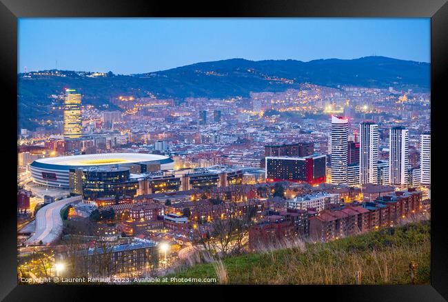 Nightfall in the great Bilbao city in Spain Framed Print by Laurent Renault