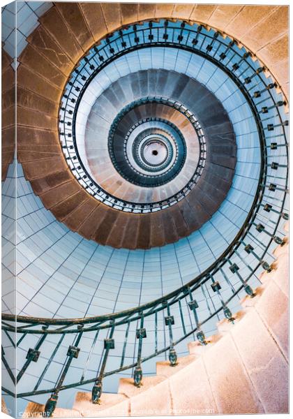 Spiral stairs and blue opaline inside the lighthouse Canvas Print by Laurent Renault