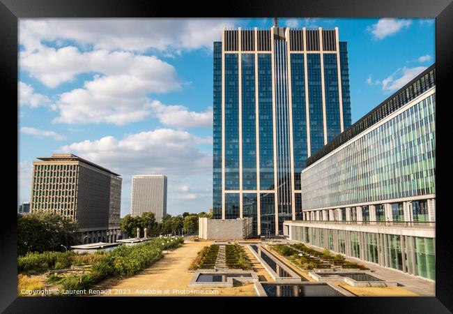 Modern glass buildings and botanical garden in Brussels Framed Print by Laurent Renault