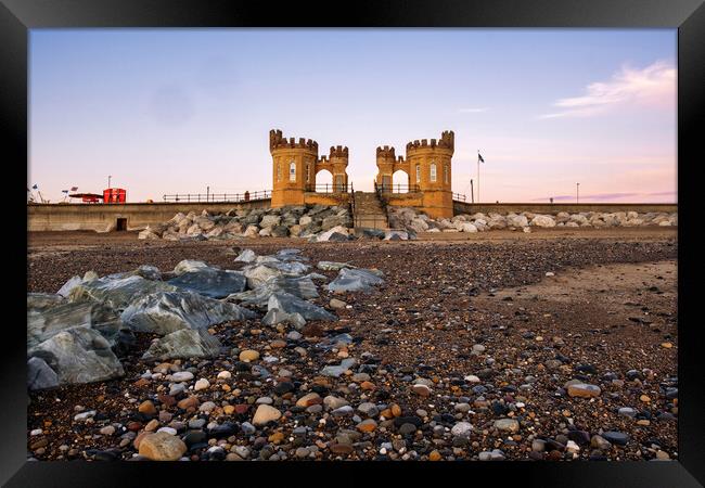 Withernsea Pier Towers Framed Print by Steve Smith