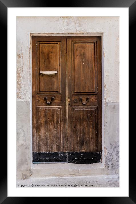 Weathered old brown wooden front door Framed Mounted Print by Alex Winter