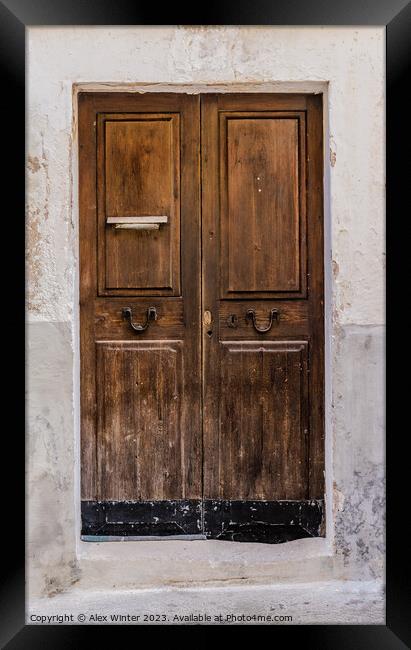 Weathered old brown wooden front door Framed Print by Alex Winter