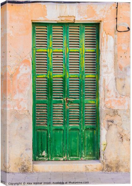 Old green wood front door Canvas Print by Alex Winter