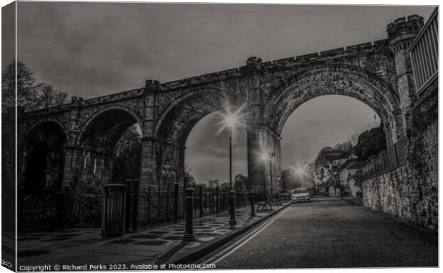Underneath the Arches Canvas Print by Richard Perks