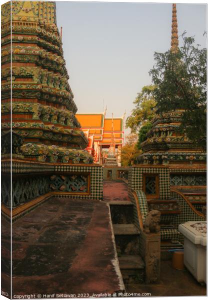 Second sidewalk view to ornate roof, flanked from  Canvas Print by Hanif Setiawan