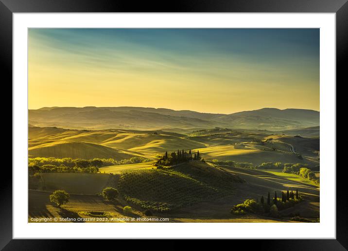 The landscape of the Val d'Orcia in the morning. Tuscany, Italy Framed Mounted Print by Stefano Orazzini