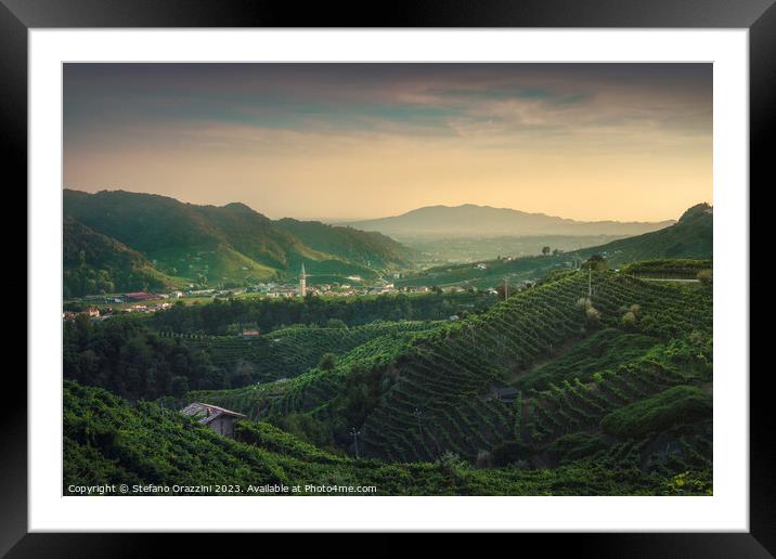Prosecco Hills, vineyards and Guia village at sunset. Framed Mounted Print by Stefano Orazzini
