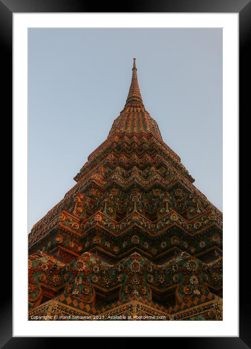 Buddha stupa reaching symmetric in the clear sky 1 Framed Mounted Print by Hanif Setiawan