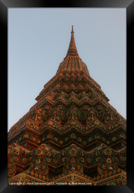 Buddha stupa reaching symmetric in the clear sky 1 Framed Print by Hanif Setiawan