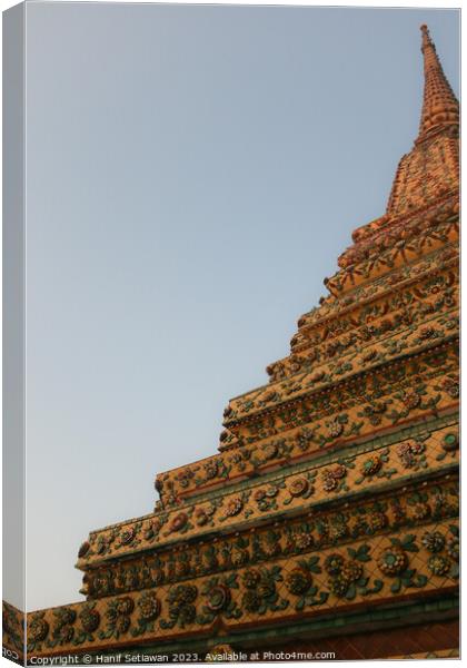 Unique view of a Buddha stupa against clear sky. 2 Canvas Print by Hanif Setiawan