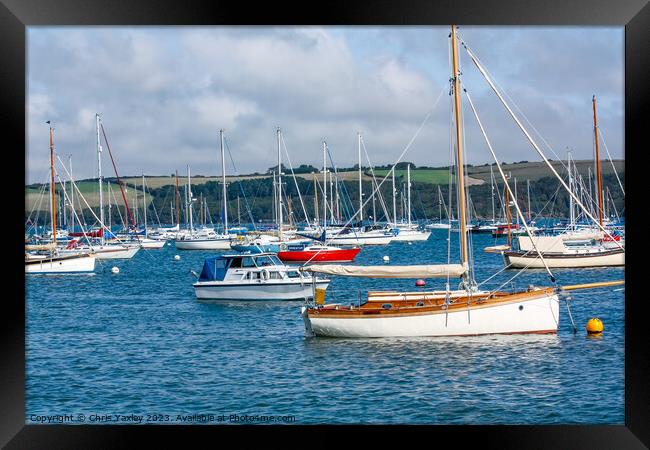 Boats moored on the River Camel, Cornwall Framed Print by Chris Yaxley