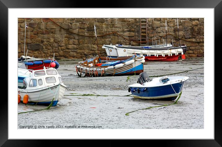 Fishing boats in Padstow Harbour at low tide Framed Mounted Print by Chris Yaxley