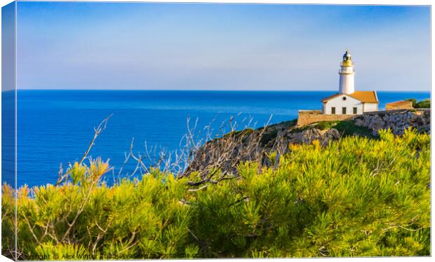 Lighthouse at the cape in Cala Rajada Canvas Print by Alex Winter