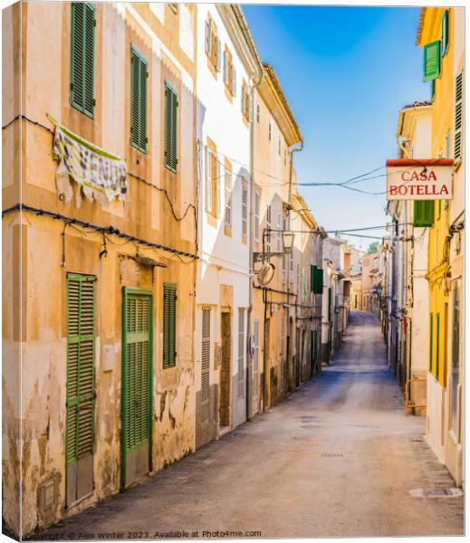Street view in Arta, rustic old town on Mallorca Canvas Print by Alex Winter