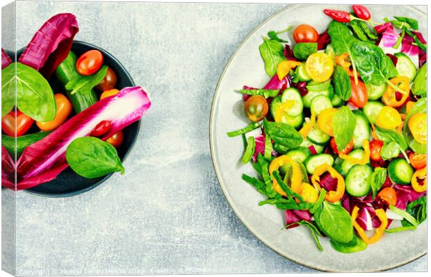 Colorful vegetable salad, top view Canvas Print by Mykola Lunov Mykola