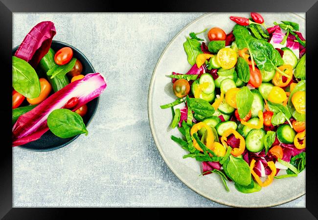 Colorful vegetable salad, top view Framed Print by Mykola Lunov Mykola