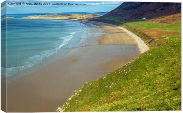 Rhossili Bay stretching into the Distance Gower Canvas Print by Nick Jenkins