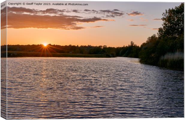 Sunset over the river Canvas Print by Geoff Taylor
