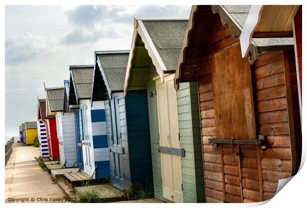 Seaside beach huts Print by Chris Yaxley
