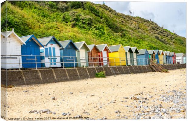 Seaside beach huts Canvas Print by Chris Yaxley