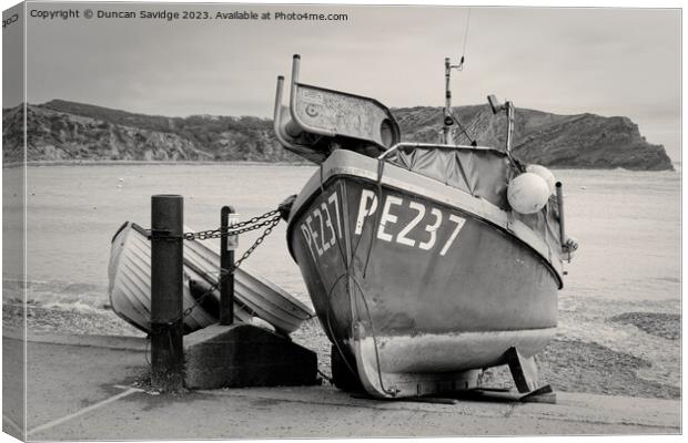 Fishing Boat at Lulworth Cove black and white Canvas Print by Duncan Savidge