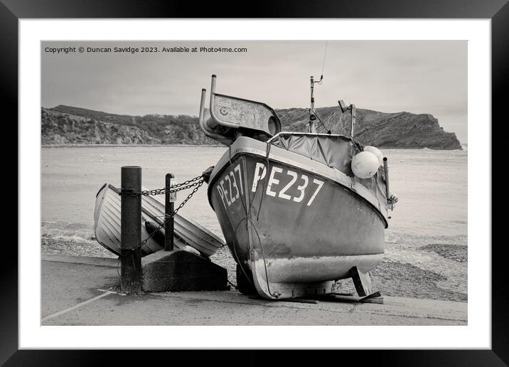 Fishing Boat at Lulworth Cove black and white Framed Mounted Print by Duncan Savidge