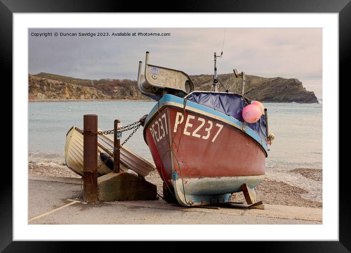 Fishing boat at Lulworth Cove Framed Mounted Print by Duncan Savidge