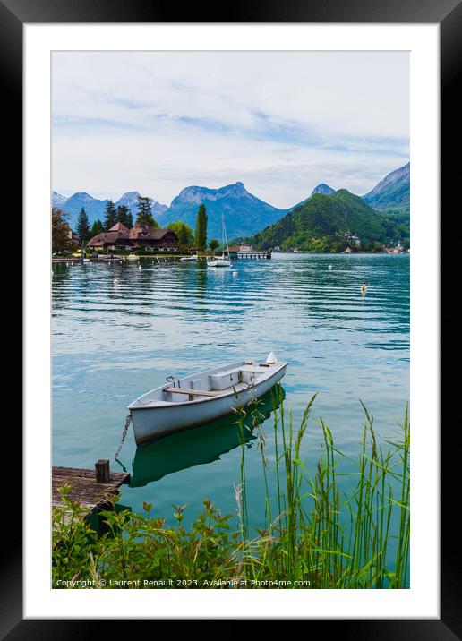 Wooden boat on the lake of Annecy Framed Mounted Print by Laurent Renault
