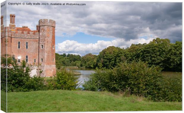 Herstmonceux Castle with moat Canvas Print by Sally Wallis