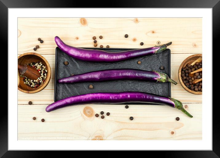 Small fresh purple eggplants Framed Mounted Print by Mykola Lunov Mykola