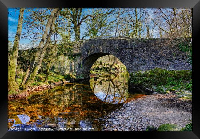 Serene Stone Bridge Framed Print by Roger Mechan