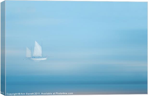 White Sails in a Blue Mist Canvas Print by Ann Garrett