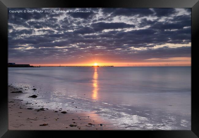 Sunrise over Walton pier Framed Print by Geoff Taylor