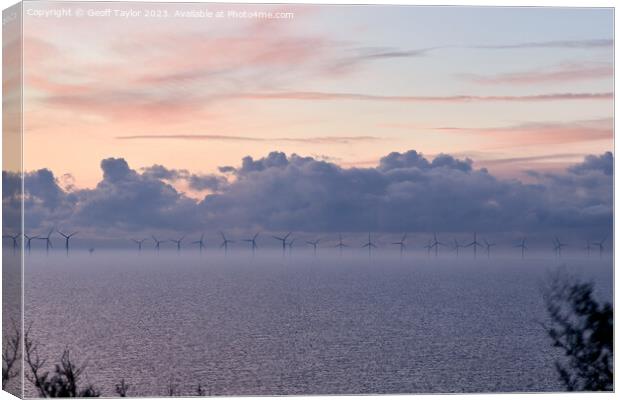 Windfarm in the mist Canvas Print by Geoff Taylor