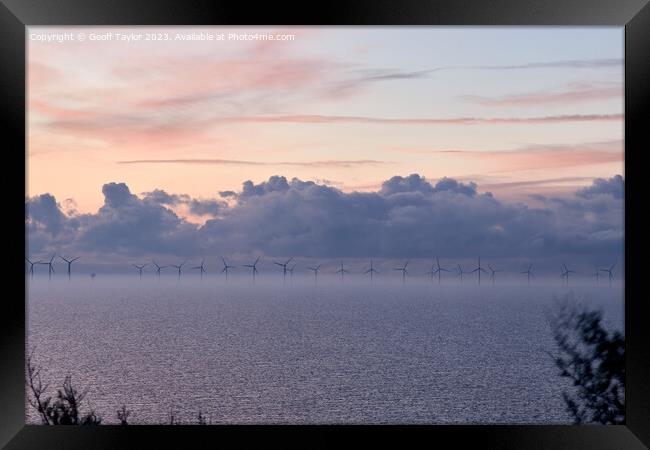 Windfarm in the mist Framed Print by Geoff Taylor