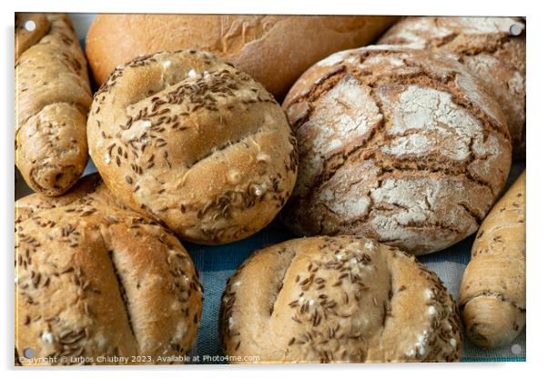 Heap of various bread rolls sprinkled with salt, caraway and sesame. Fresh rustic bread from leavened dough. Assortment of freshly of bakery products Acrylic by Lubos Chlubny